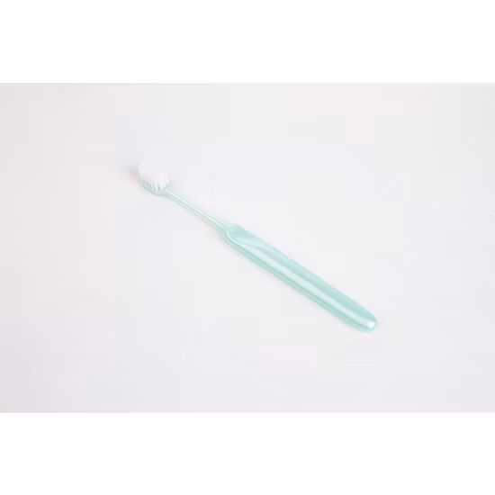 Cepillo de dientes manual para adultos con cerdas en espiral suaves de alta calidad para blanquear los dientes